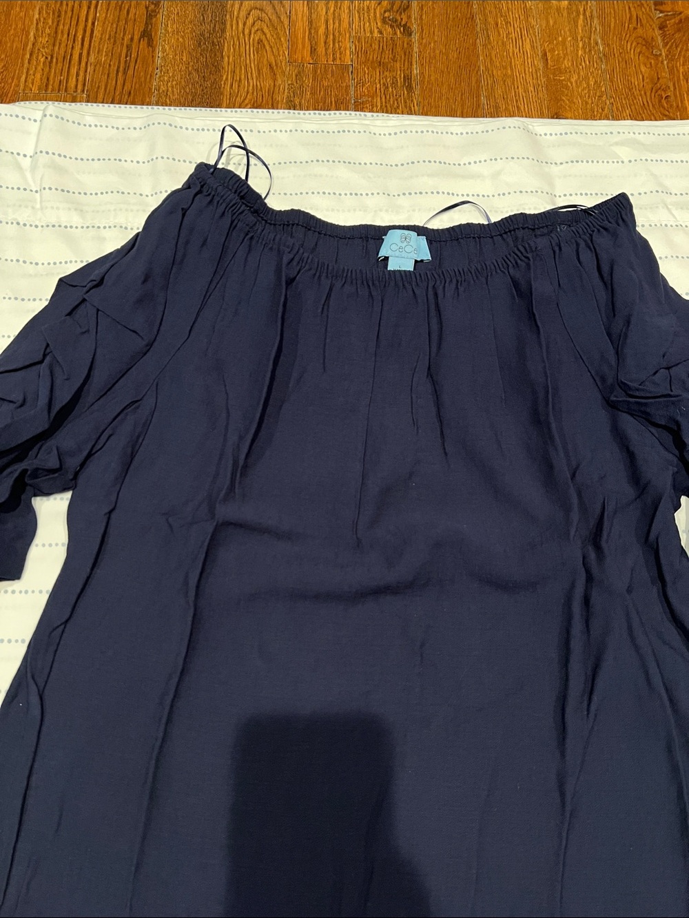 CeCe Off the Shoulder Navy Blouse with Smocked Neckline